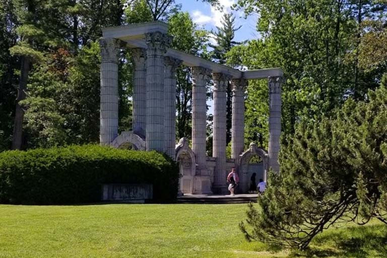 The Guild Park with columns and trees
