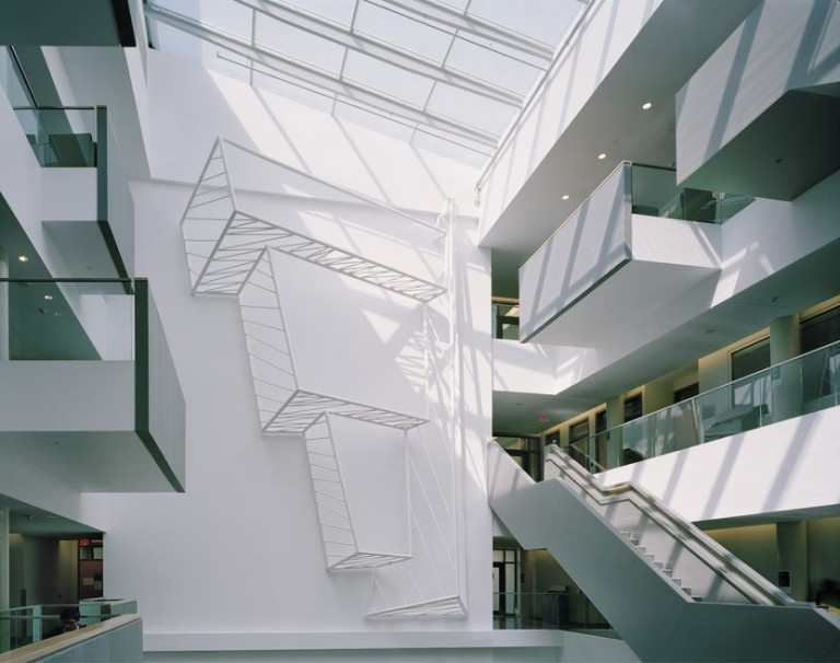 Installation in a three story white building