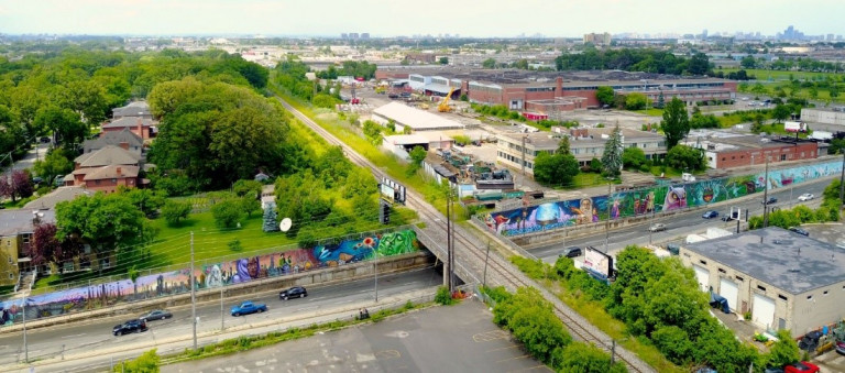 Arial shot of a long mural across a T intersection