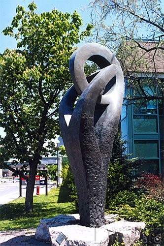 Installation of an abstract shape on stone plinth