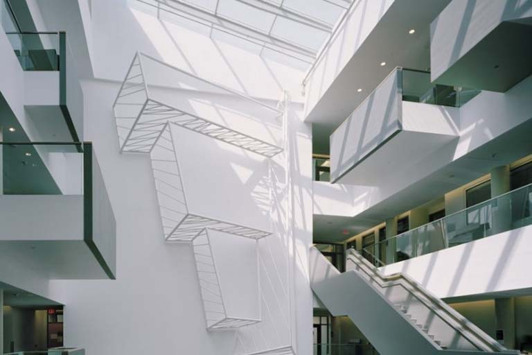 Installation in a three story white building