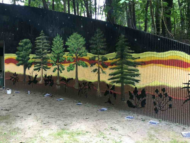 A mural of different types of trees.